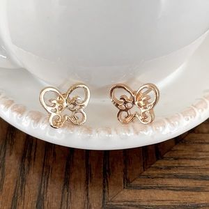Gold butterfly stud earrings